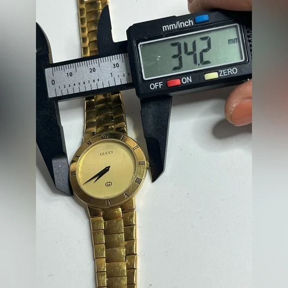 Classic GUCCI 3300 M 18K Gold Plated champagne dial; Men’s watch.